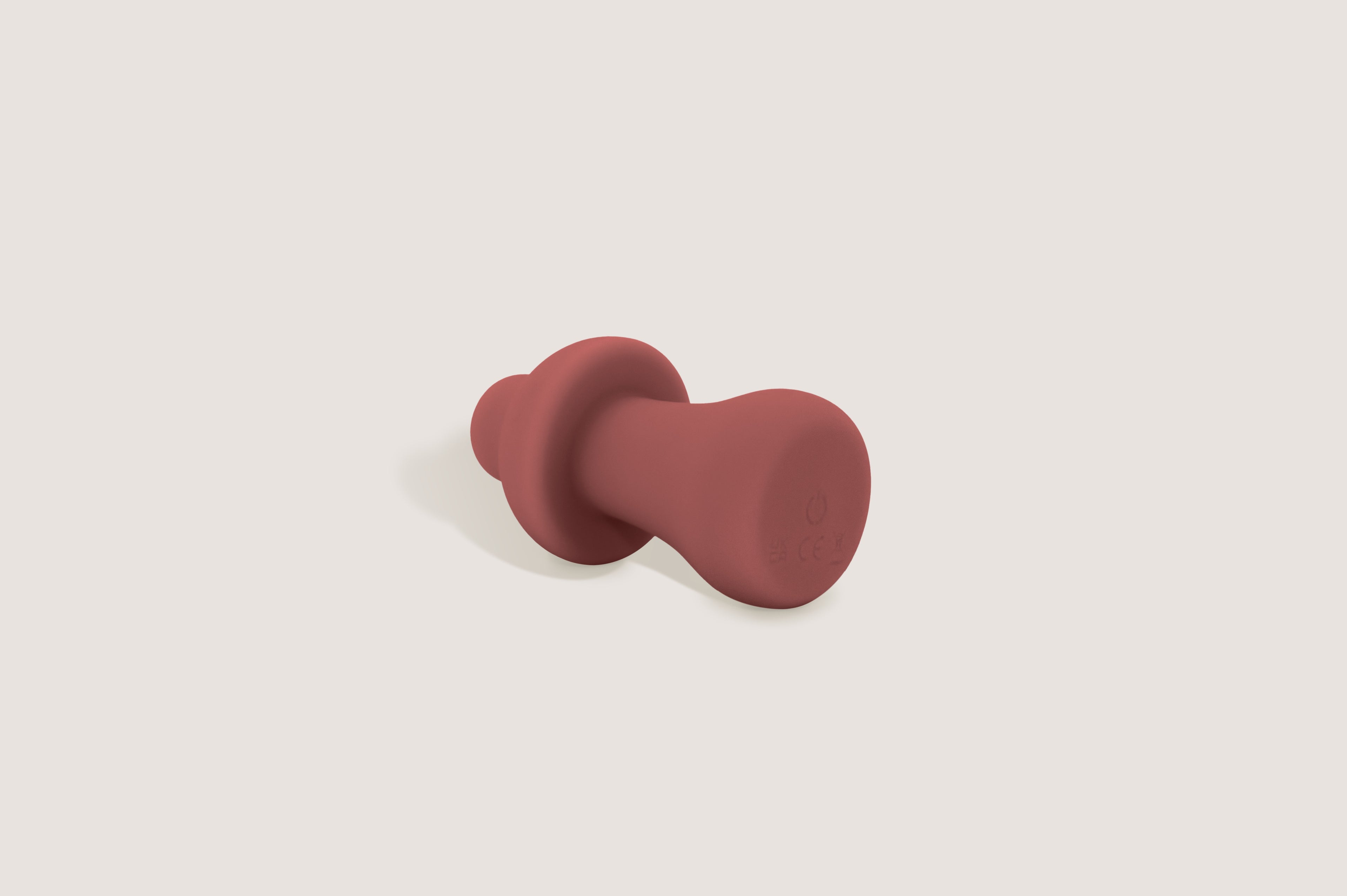 Labas Mushy rose gold pleasure massager detail, featuring the premium soft-touch silicone finish and integrated power button for external vibration.